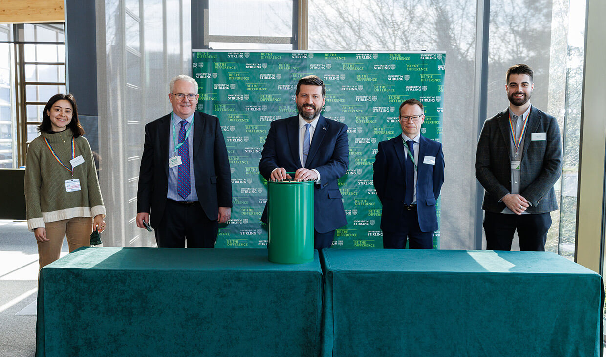 Group of people with time capsule