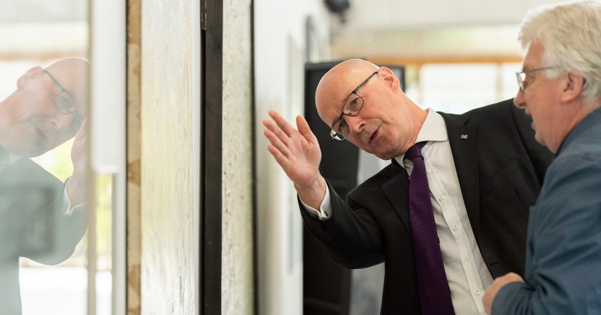 First Minister John Swinney and artist Glen Onwin