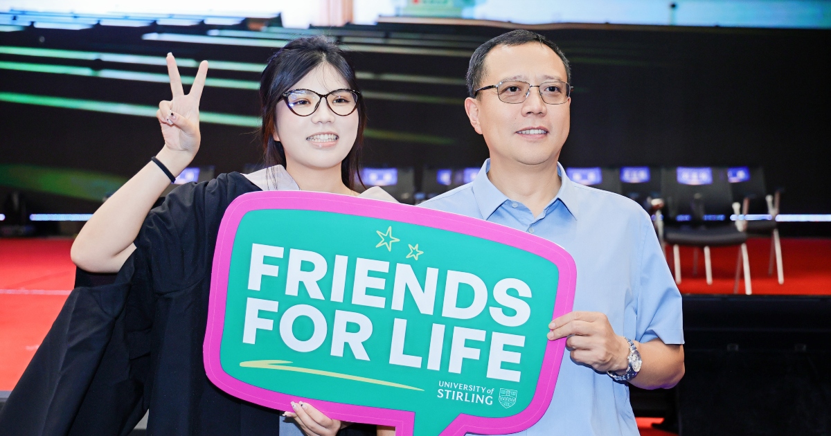 Chengdu graduate celebrates with gues.