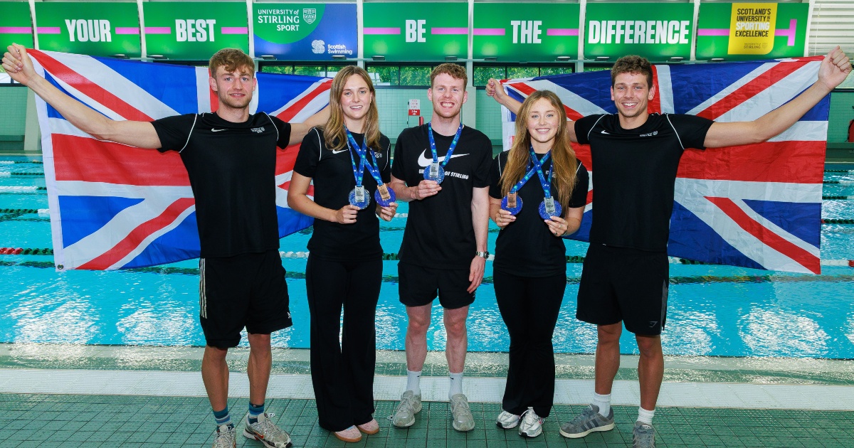 George Smith, Evie Davis, Rory Dickson, Lucy Grieve and David Annis pose poolside.