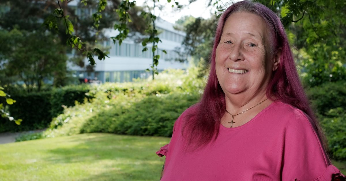 Lynda Morrison standing outside the University of Stirling