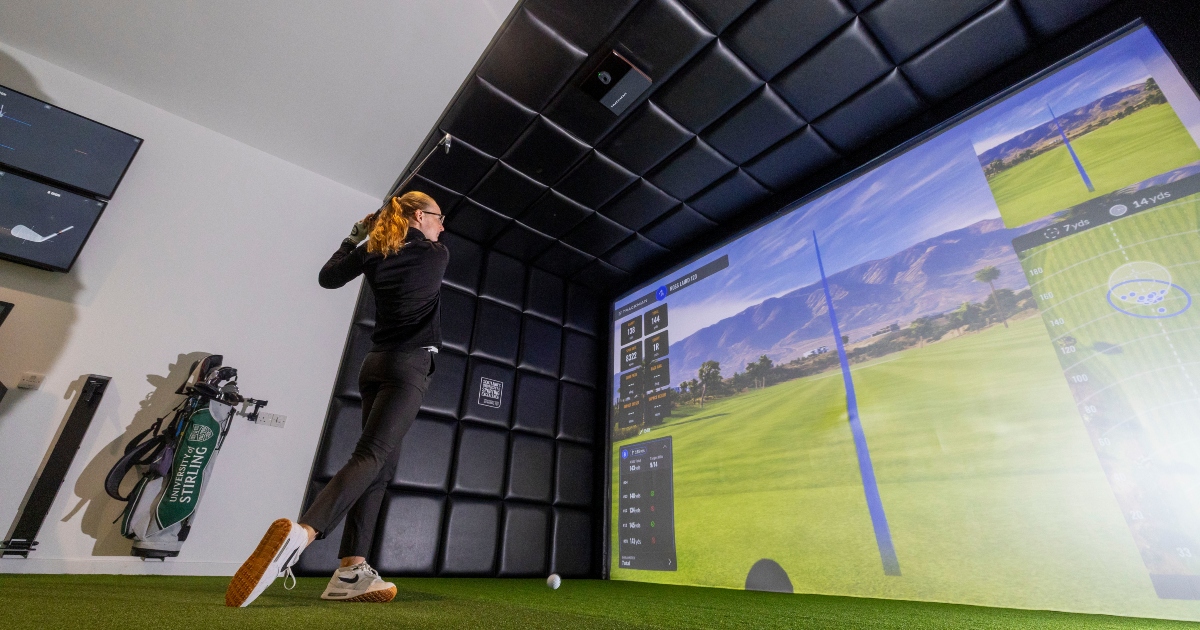 Louise Duncan plays a shot in the Performance Golf Studio.