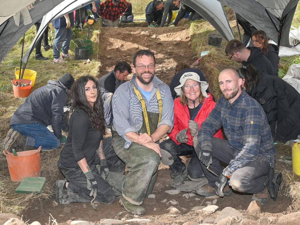 people outside at dig